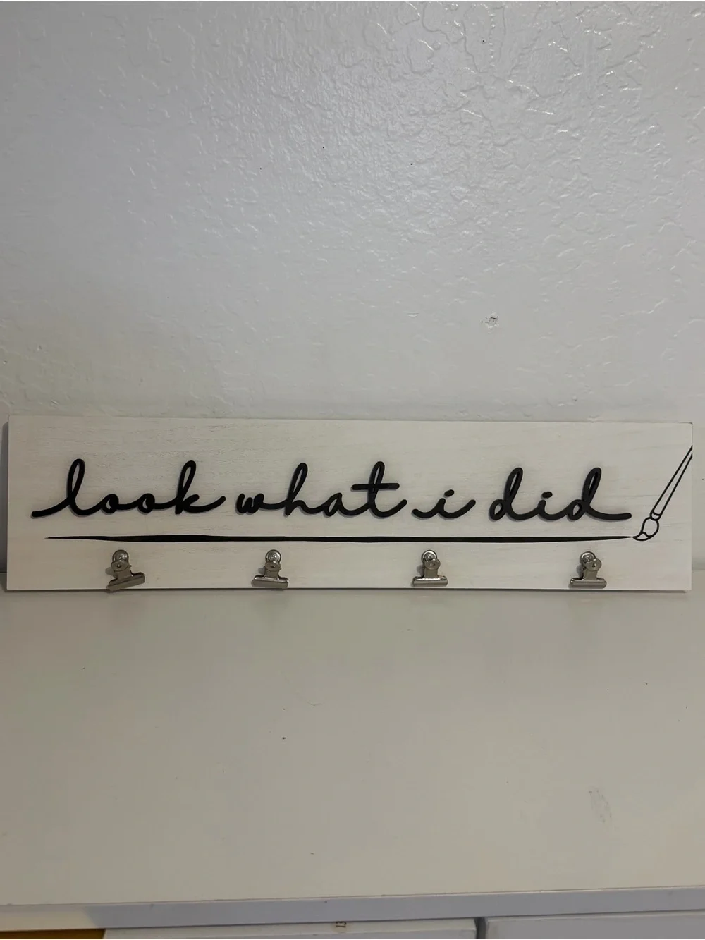 Kirkland Signature White Wall Clip Display with Black Script “Look what I did”